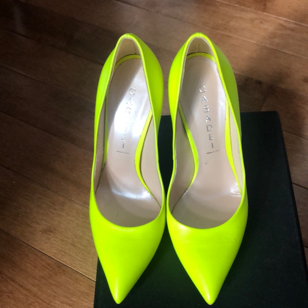 Neon yellow pumps